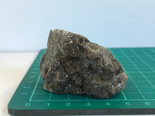 Load image into Gallery viewer, Garnet (Andradite) on rock