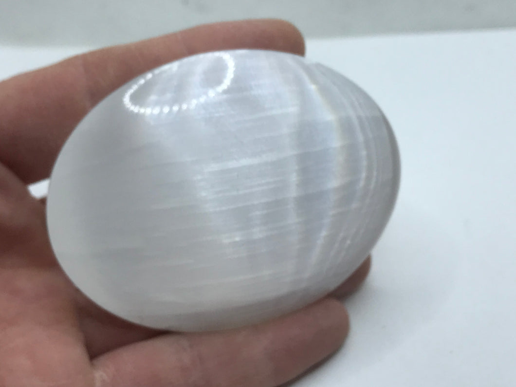 Selenite palm stone