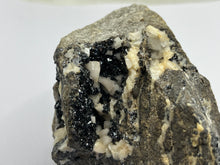 Load image into Gallery viewer, Magnetite, Amphibole,orthoclase And Quartz
