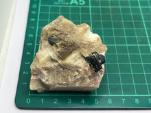 Load image into Gallery viewer, Phlogopite mica in calcite
