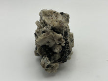 Load image into Gallery viewer, Magnetite on orthoclase
