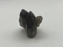 Load image into Gallery viewer, Spessartine garnets on smoky Quartz
