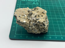 Load image into Gallery viewer, Pyrite micro cubes on matrix
