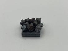 Load image into Gallery viewer, Magnetite on a magnet
