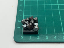 Load image into Gallery viewer, Magnetite on a magnet
