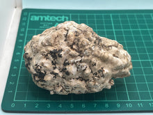 Load image into Gallery viewer, Uncut Merlinite geode
