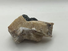 Load image into Gallery viewer, Phlogopite mica on orange calcite
