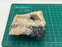 Load image into Gallery viewer, Phlogopite mica on orange calcite
