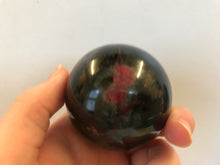 Load image into Gallery viewer, Red plum blossom jade sphere
