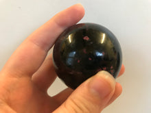 Load image into Gallery viewer, Red plum blossom jade sphere
